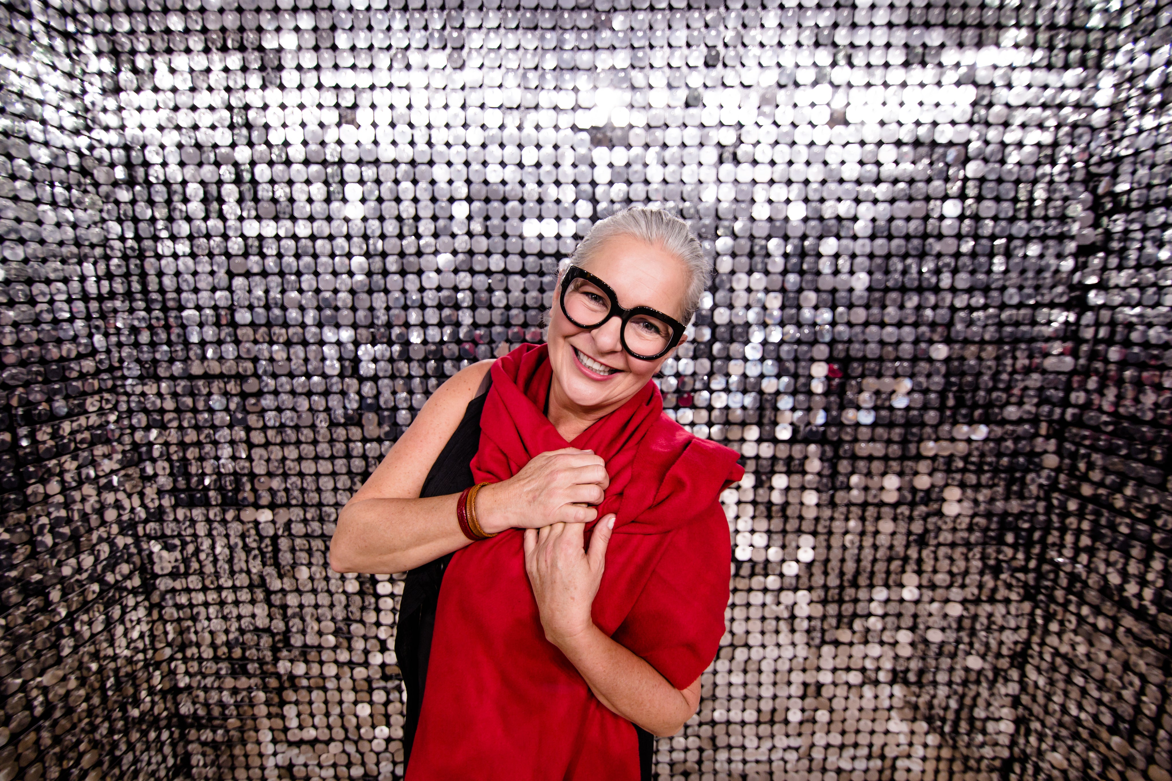 files/happy-woman-in-silver-shiny-room.jpg